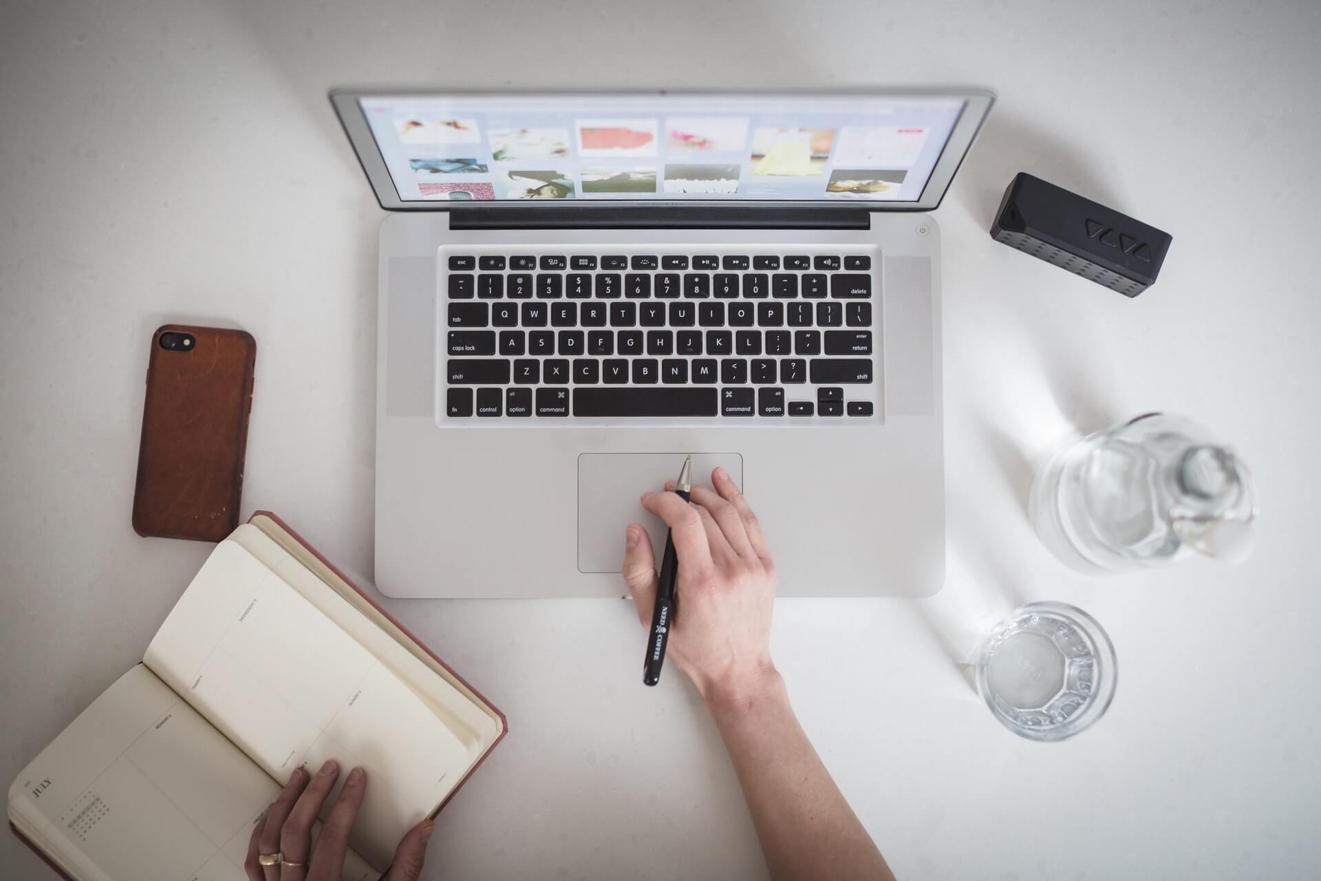 laptop and taking notes